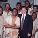 Joseph Shabalala, front left, founder of South Africa’s Ladysmith Black Mambazo, stands with the group and Paul Simon, front right in 1993.